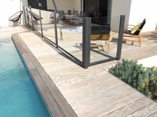 Fabrication d'une rampe en fer et verre pour protection de piscine à Montpellier (34)