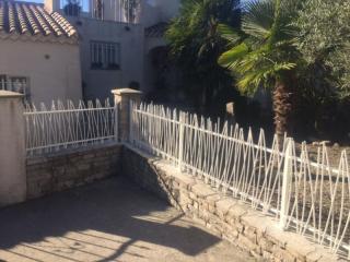 Grille de clôture en fer dans l'Hérault